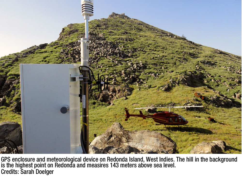 GPS enclosure and meteorological device on Redonda Island, West Indies. The hill in the background is the highest point on Redonda and measures 143 meters above sea level.