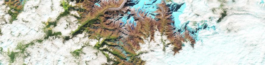 The false-color images above show a glacial lake in the Himalayas nearly doubling in length over 30 years. Ice is represented as light blue, while significant meltwater is dark blue. Rocks are brown; vegetation is green. The growth of glacial lakes can increase the risk of flooding in nearby valleys. Image: NASA. The false-color images above show a glacial lake in the Himalayas nearly doubling in length over 30 years. Ice is represented as light blue, while significant meltwater is dark blue. Rocks are brown; vegetation is green. The growth of glacial lakes can increase the risk of flooding in nearby valleys. Image: NASA.