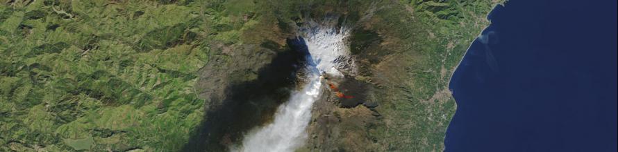 The Operational Land Imager (OLI) on the Landsat 8 satellite acquired this top image of Mount Etna on December 28, 2018. The image highlights the active vent and thermal infrared signature from lava flows, which can be seen near the newly formed fissure on the southeastern side of the volcano. The image was created with data from OLI (bands 4-3-2) and the Thermal Infrared Sensor (TIRS) on Landsat 8. Image: NASA. The Operational Land Imager (OLI) on the Landsat 8 satellite acquired this top image of Mount Etna on December 28, 2018. The image highlights the active vent and thermal infrared signature from lava flows, which can be seen near the newly formed fissure on the southeastern side of the volcano. The image was created with data from OLI (bands 4-3-2) and the Thermal Infrared Sensor (TIRS) on Landsat 8. Image: NASA.