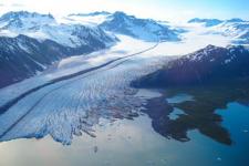 The terminus of Bear Glacier occurs in iceberg filled freshwater lagoon. Kenai Fjords National Park, Alaska. Image: NASA.