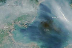 Satellite image of smoke produced by massive explosions in Tianjin (Image: NASA)