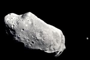 An image of an asteroid in outer space, image courtesy of NASA
