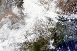 NASA satellite imagery of Northern India on June 2013, showing rainclouds. This data could be combined by Geo-DRM system with other information to improve weather forecast.