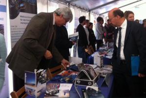 Minister Lersch-Mense of North Rhine Westphalia visiting the UN-SPIDER stand