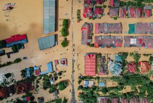 Flooded village with residential houses.