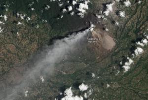 Similar eruption of the Mount Sinabung in Indonesia. Image courtesy of NASA Earth Observatory image by Jesse Allen and Robert Simmon, caption by Robert Simon. 