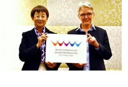 Mayor of Sendai City and UNISDR Chief present the Logo of the Conference