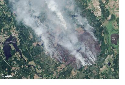 This natural-color image of the fire in Sweden was captured by Landsat 8