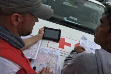 Red Cross members Use OpenStreetMap After Typhoon Haiyan in the Philliphines