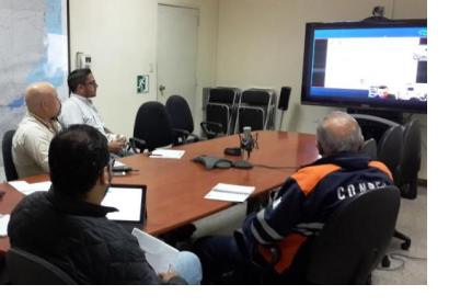 EOC members in a video conference with CONAE
