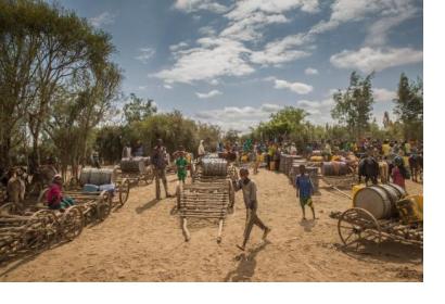 Children outside a UNICEF-supported water point in a drought-affected region in Ethiopia. Image: UNICEF Ethiopia/CC BY-NC-ND 2.0