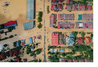 Flooded village with residential houses.